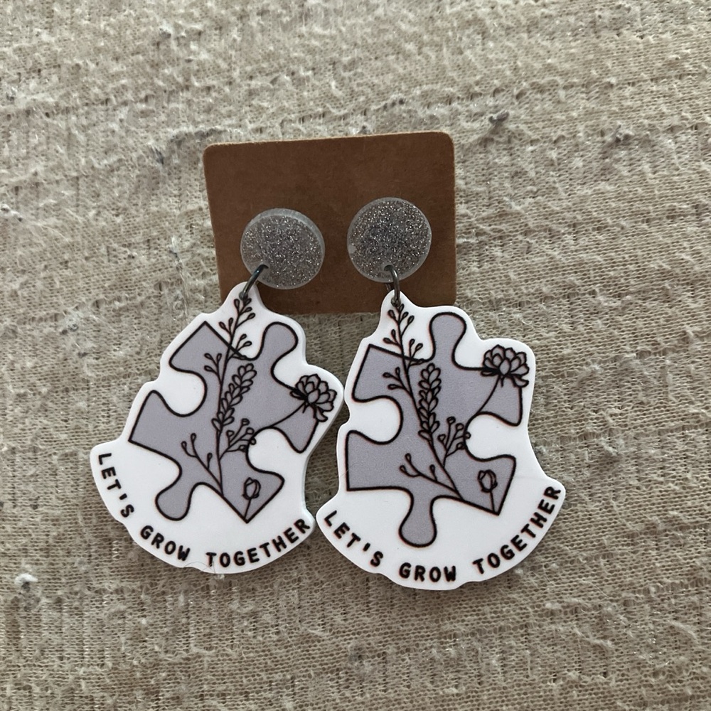 Puzzle Piece Earrings with Floral Design